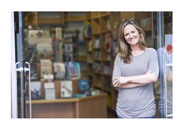 Build relationships with local booksellers first and prepare a compelling pitch.